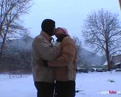 She blows him in the snow!